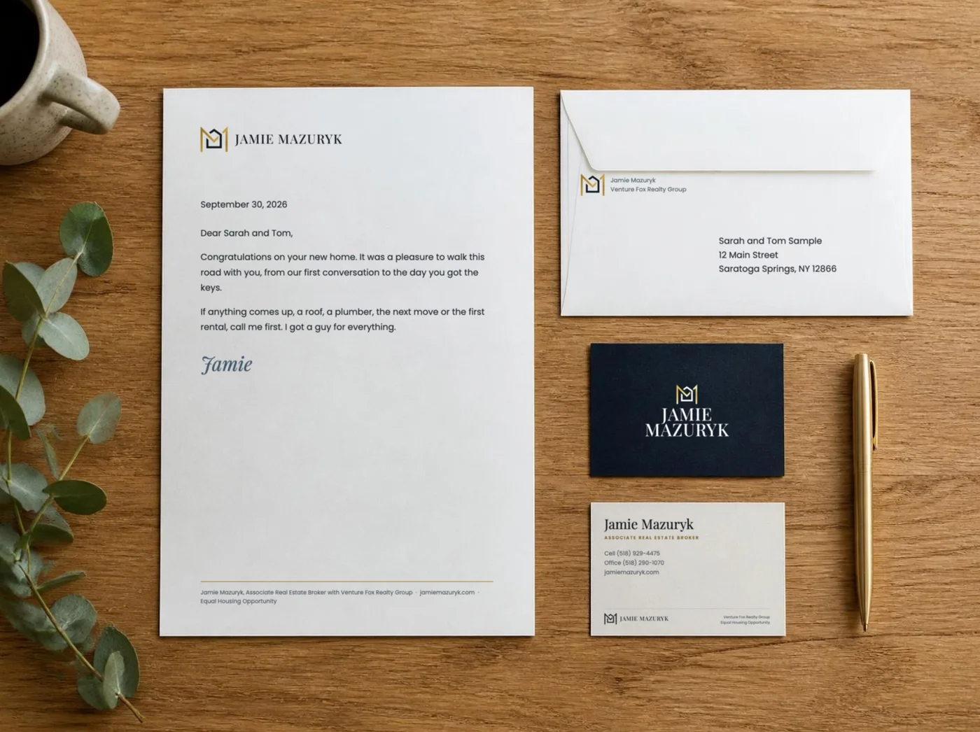 Jamie Mazuryk letterhead, envelope and business cards on a desk